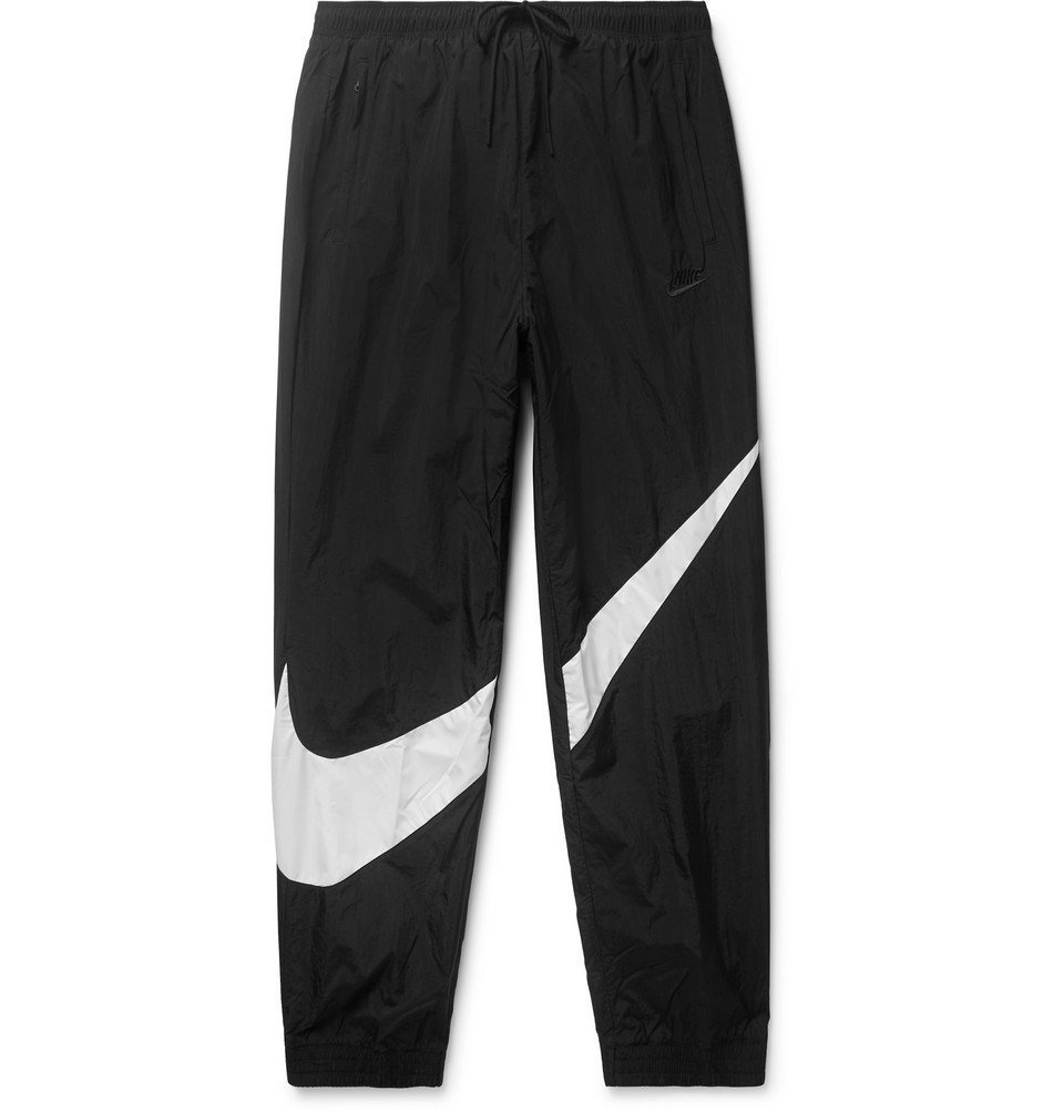 Nike - Solo Swish Tapered Logo-Embroidered Shell Track Pants - Black Nike