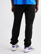 AMIRI - Tapered Logo-Print Cotton-Jersey Sweatpants - Black