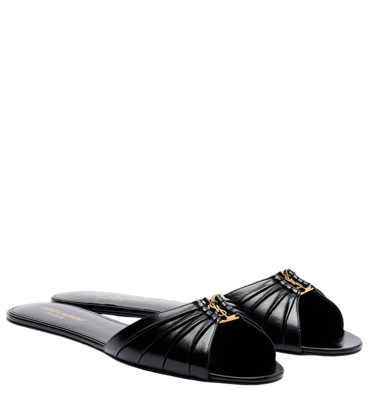 Photo: Saint Laurent Cassandre leather slides