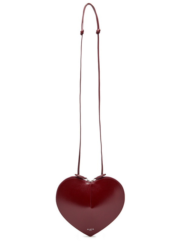 Photo: Alaïa Le Couer Glossed Leather Cross-body bag - Burgundy - One Size