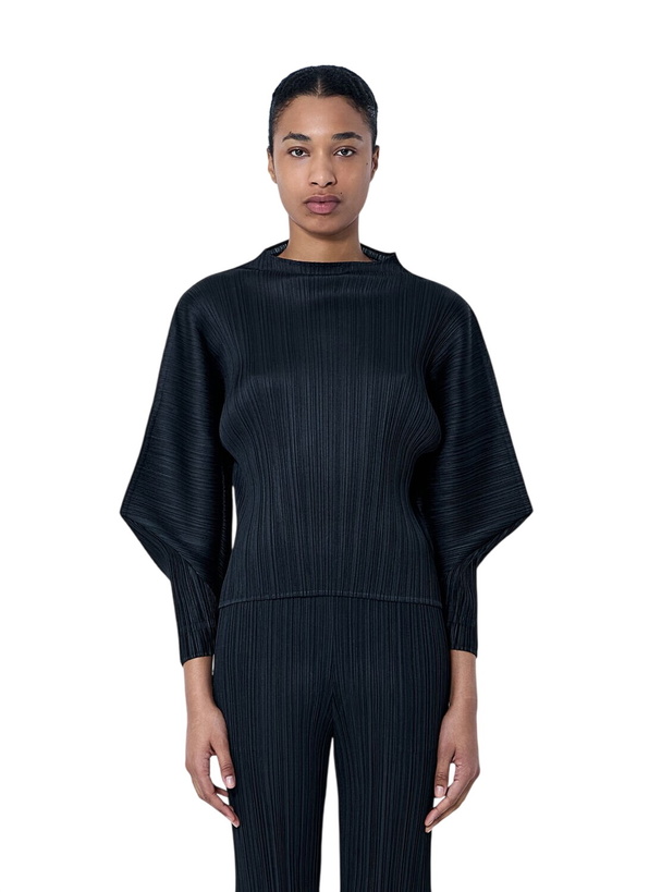 Photo: Pleats Please Issey Miyake Pleated Knit Top