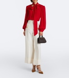 Valentino Garavani VLogo Mini leather top-handle bag