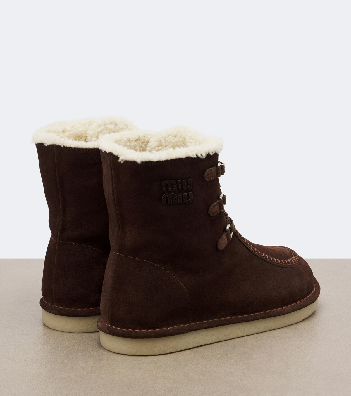 Miu Miu Shearling-lined suede lace-up boots