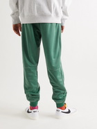 Nike - Tapered Logo-Embroidered Recycled Tech-Jersey Sweatpants - Green