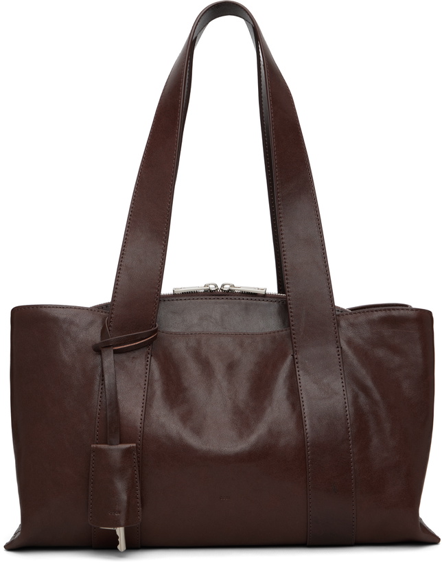 Photo: OSOI Brown Shell Duffel Bag