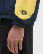New Balance In Game Woven Track Jacket blue/yellow Men
