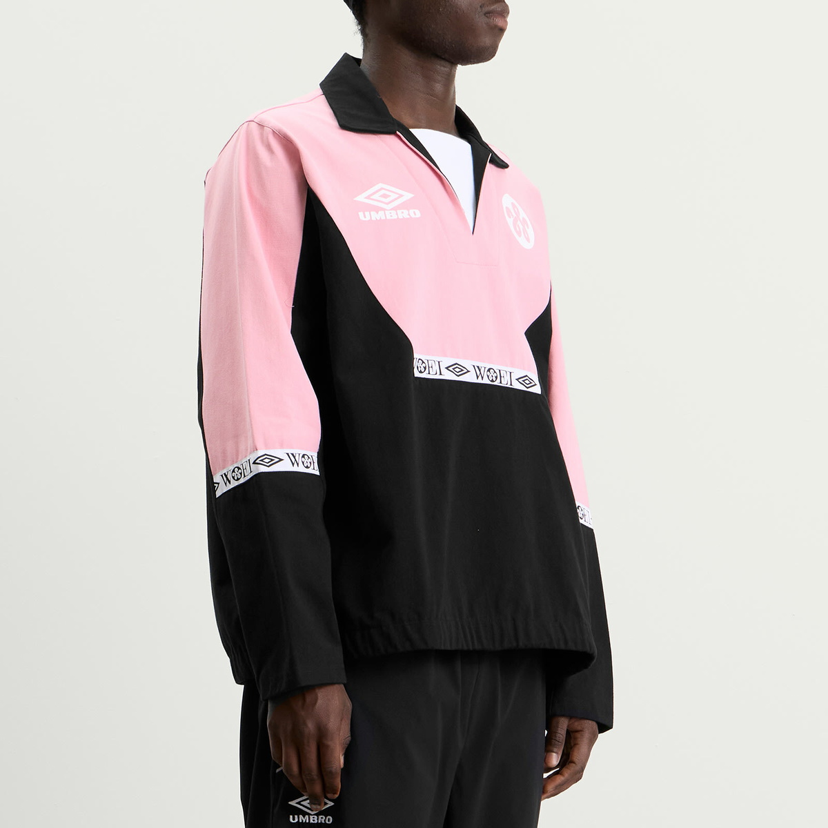 Umbro Men's x WOEI Drill Top in Black/Pink