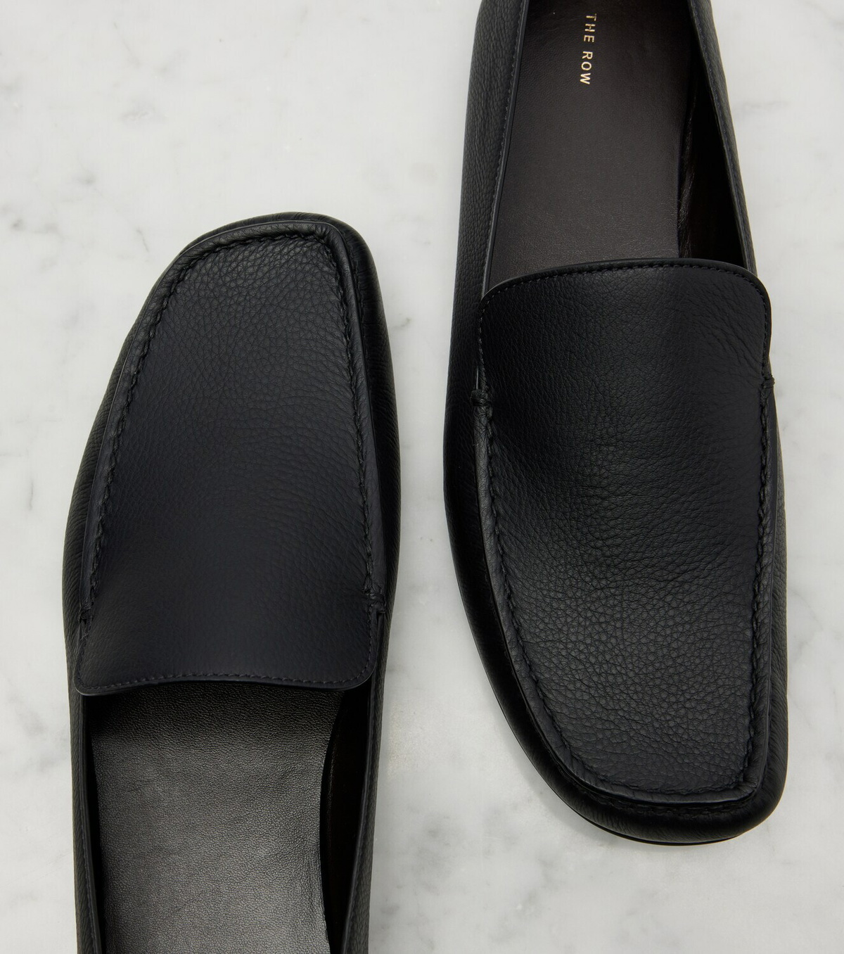 The Row Leo leather slip-on shoes