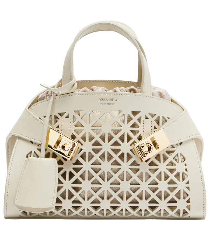 Photo: Ferragamo Hug Mini laser-cut leather top-handle bag
