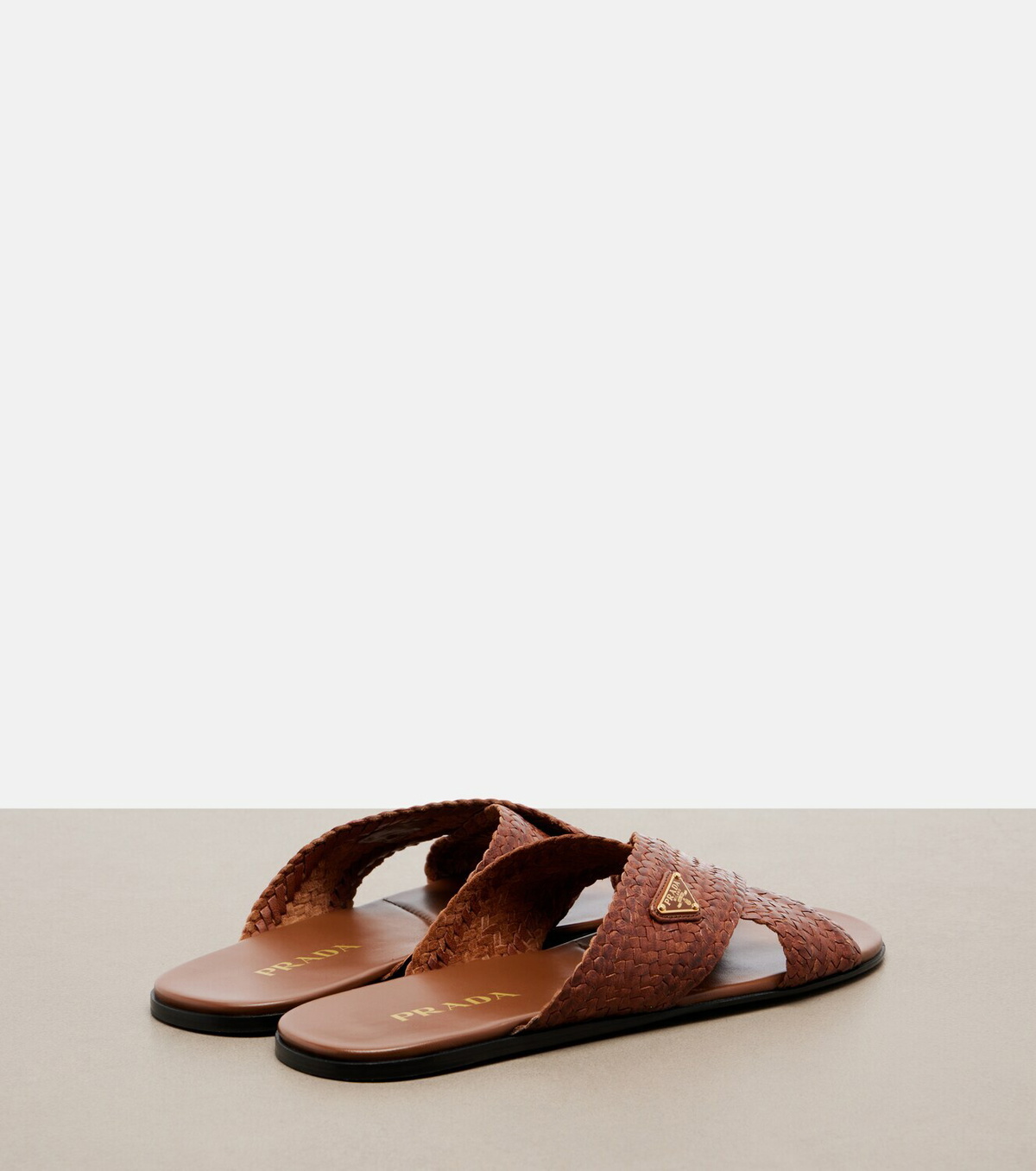 Prada Woven leather slides