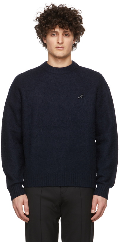 Photo: Axel Arigato Navy Pin Sweater