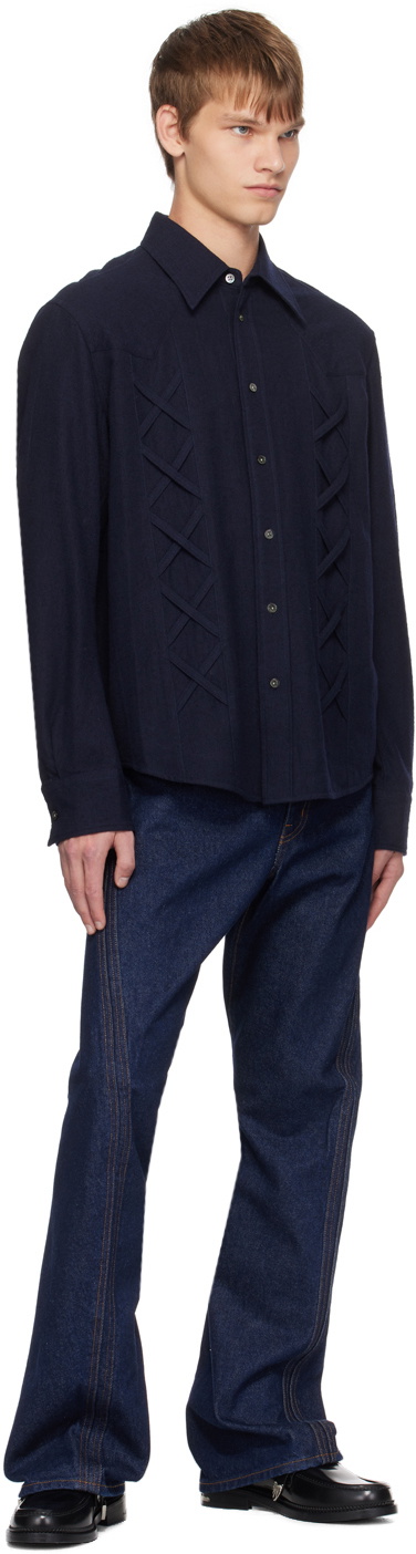 NVRFRGT Indigo Twisted Jeans