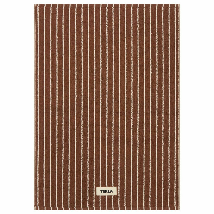 Photo: Tekla Fabrics Organic Terry Bath Mat in Rust Stripes 