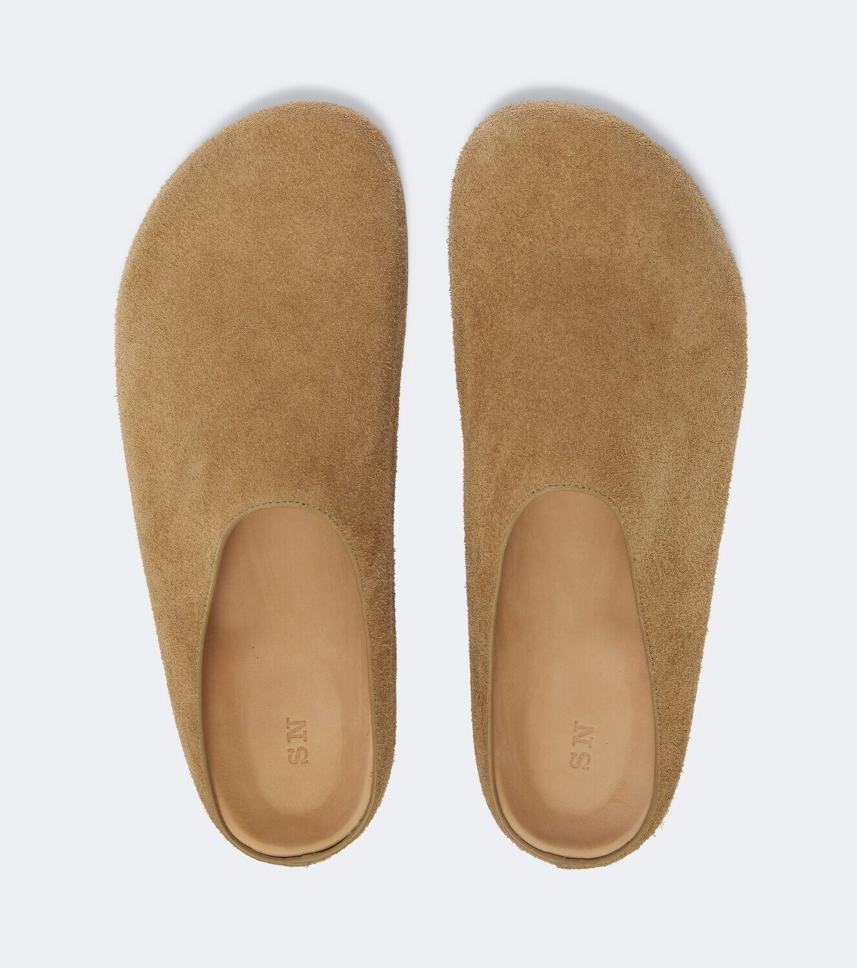 Studio Nicholson Wearing suede mules