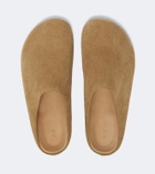 Studio Nicholson Wearing suede mules