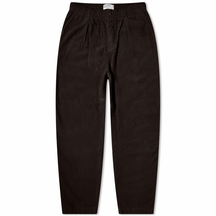 Photo: Universal Works Men's Corduroy Pleated Track Pant in Licorice
