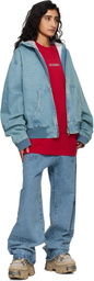 VETEMENTS Blue Passport Stamps Jeans