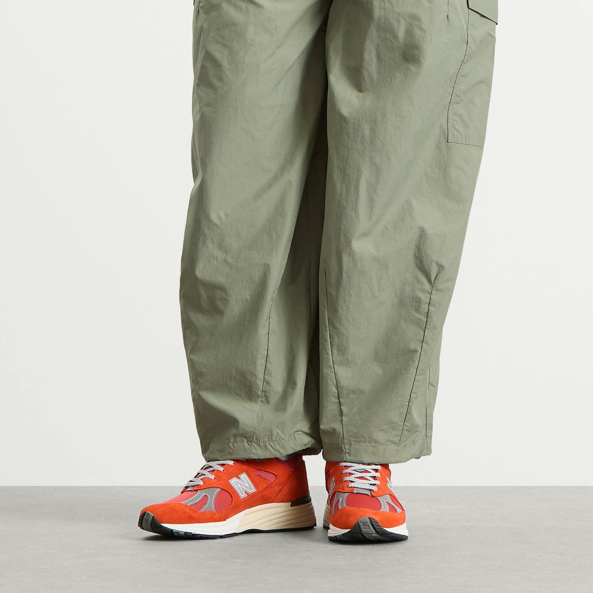 New Balance 991v2 Sneaker in Grenadine/Fire Whirl