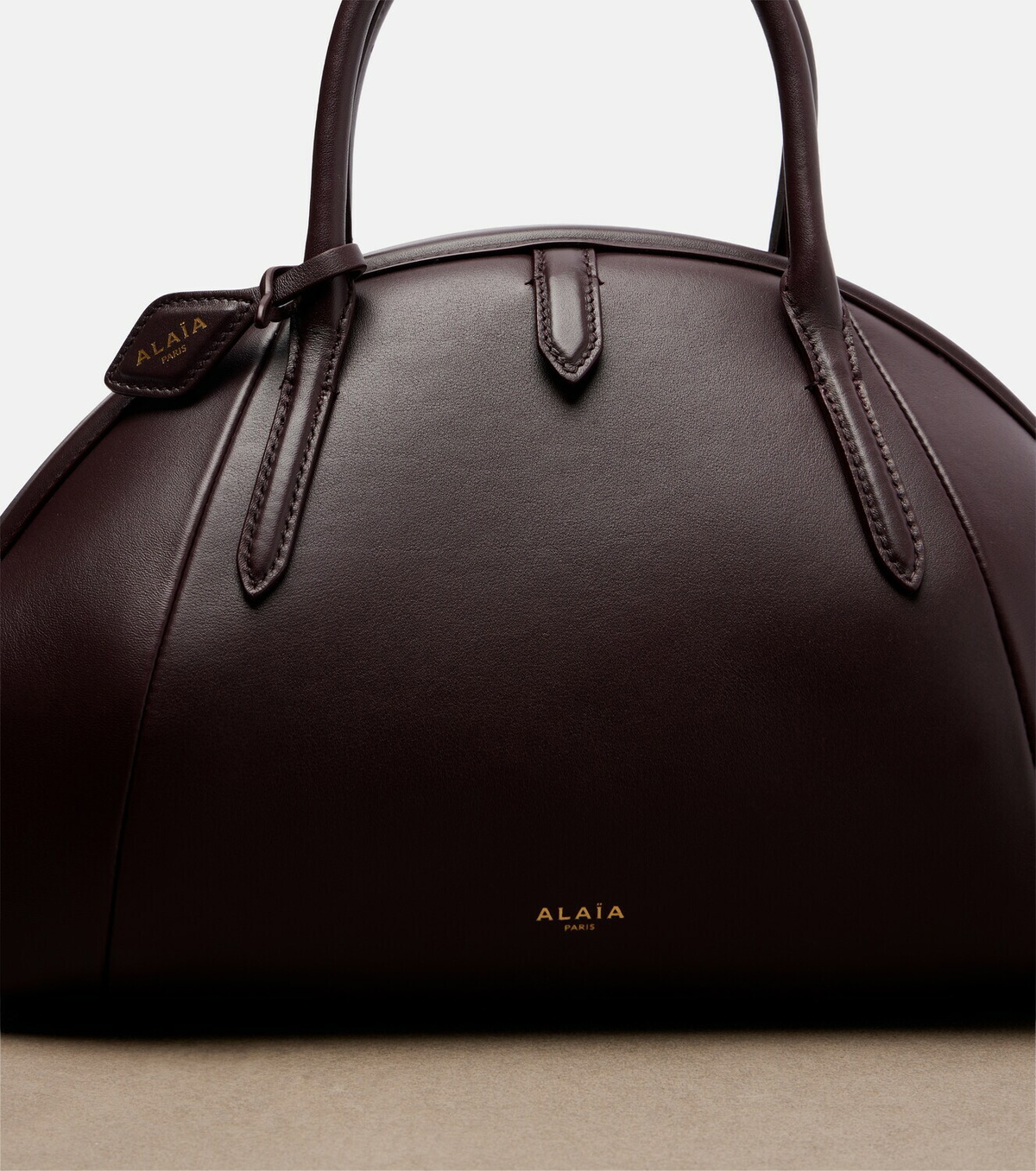Alaïa Purse Small leather top-handle bag ALAÏA