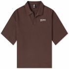 New Balance Women's Linear Heritage French Terry Collared Shirt in Black Coffee