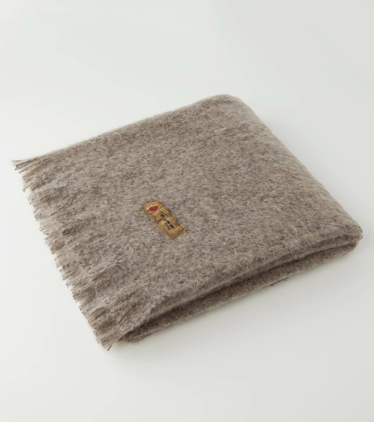 The House of Lyria Madornale fringed wool-blend blanket
