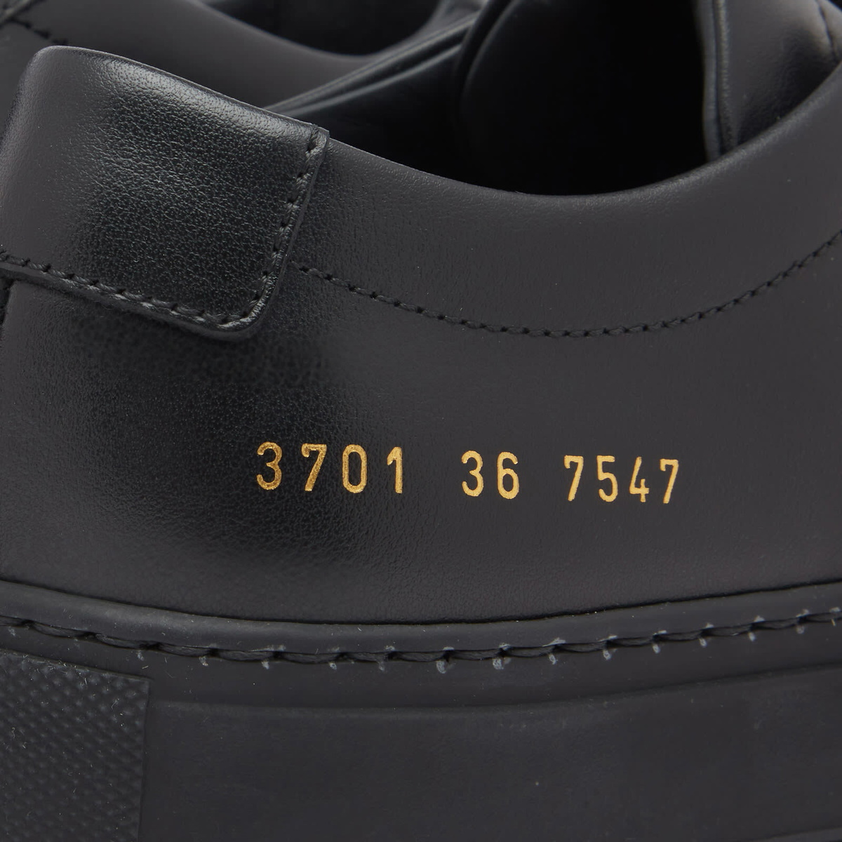 Woman by Common Projects Women's Original Achilles Low Sneakers in Black