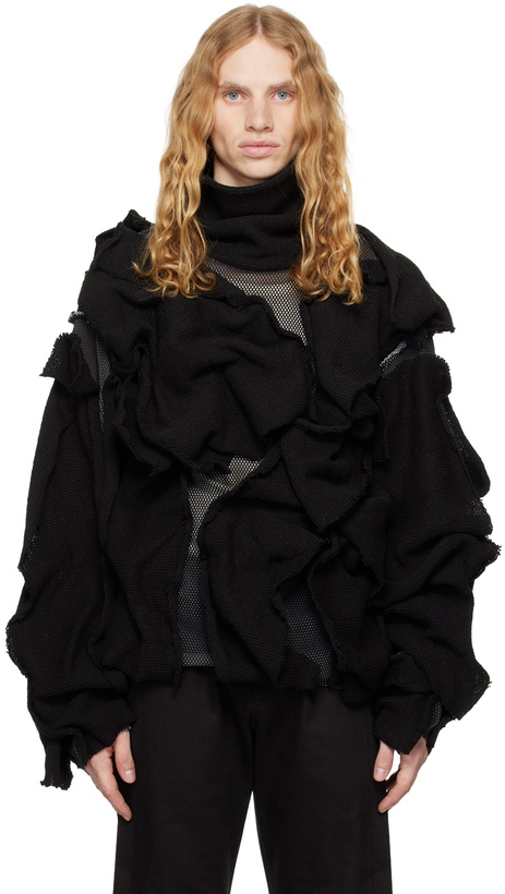 Photo: CARNET-ARCHIVE Black Peel-Off Knit Turtleneck