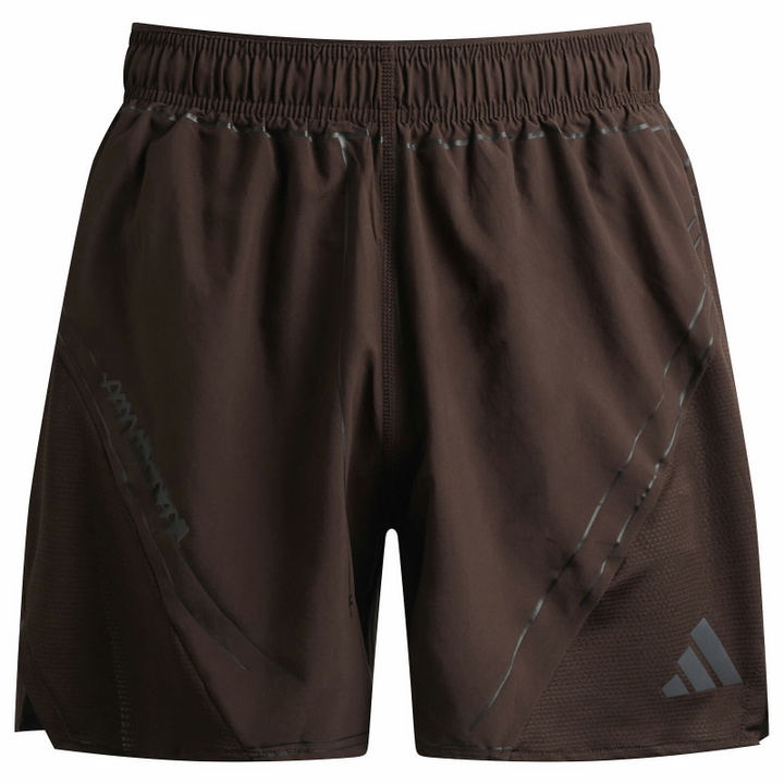 Photo: Adidas Men's x Song for the Mute Running Shorts in Aurora Coffee