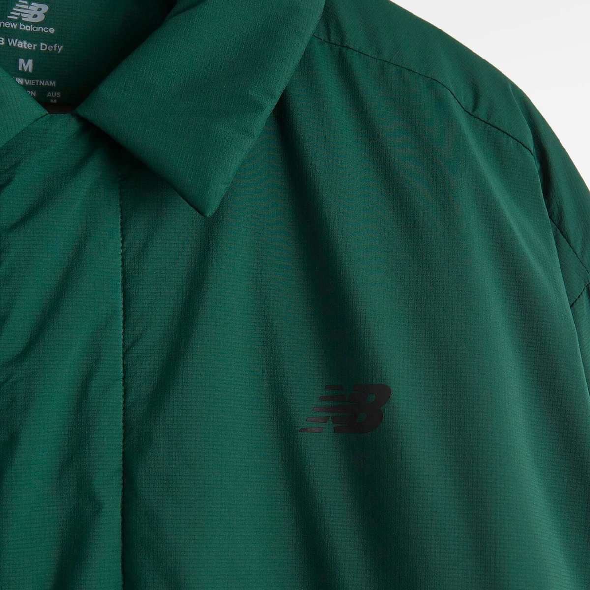 New Balance Coaches Jacket in Nightwatch Green