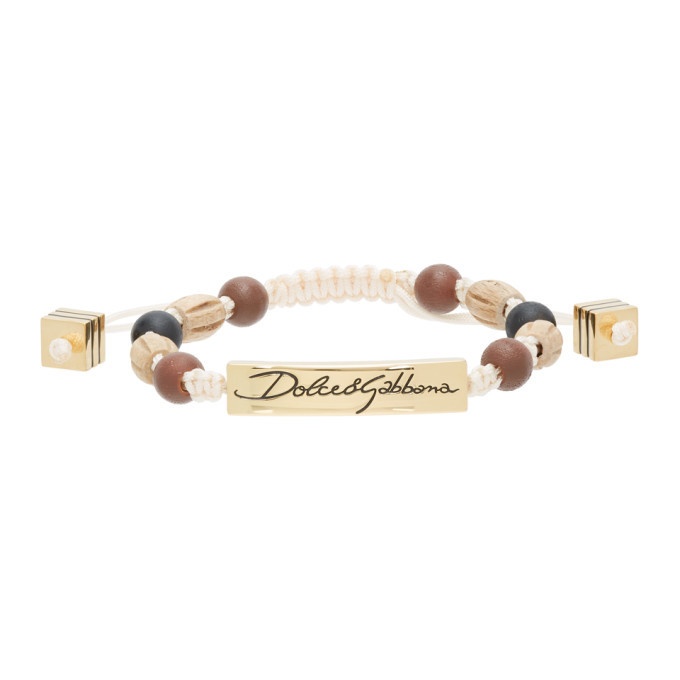 Photo: Dolce and Gabbana Off-White and Gold Beaded Logo Bracelet