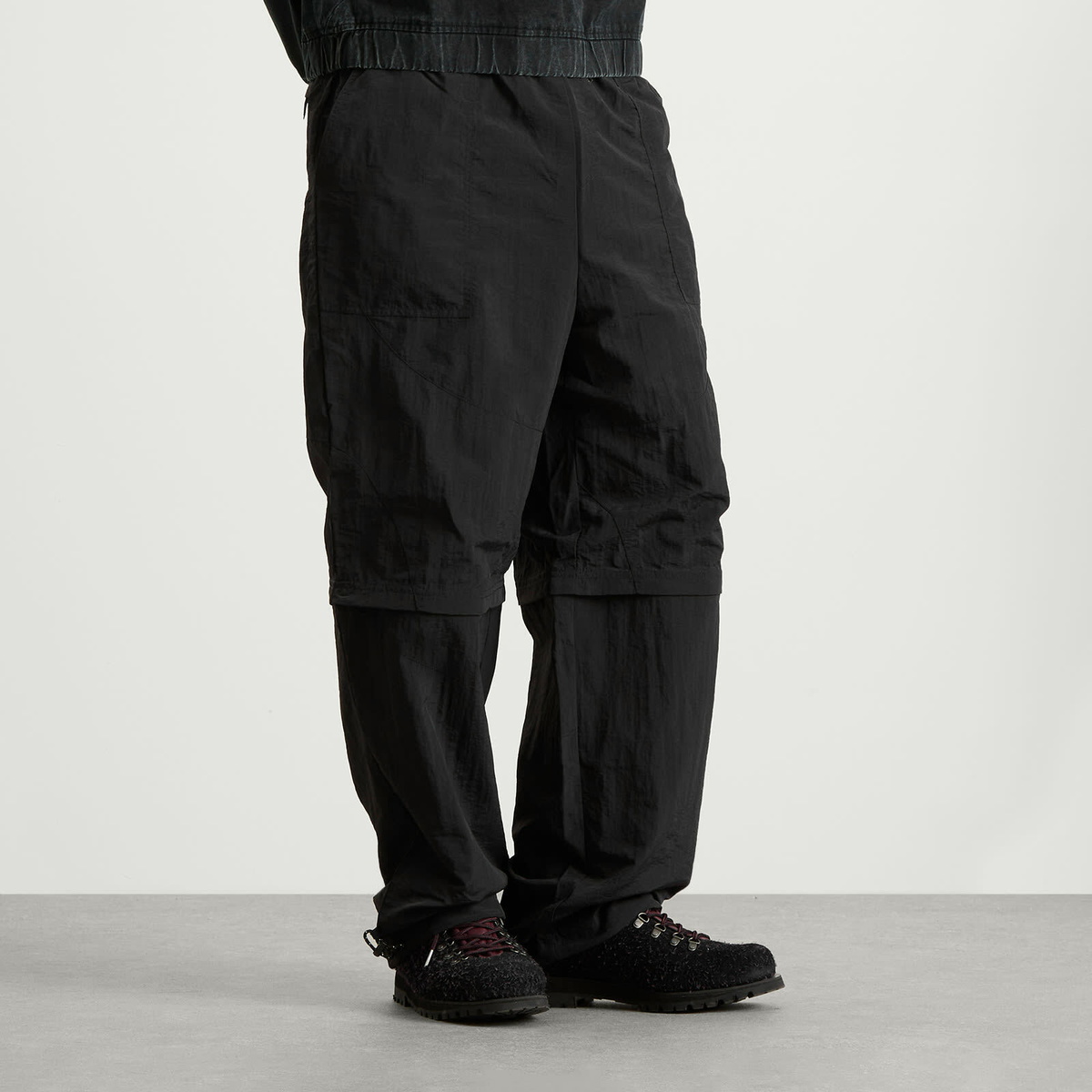 Umbro Men's Zip Off Loose Fit Pants in Black Umbro