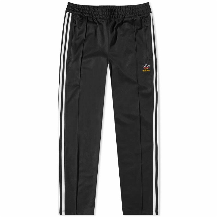 Photo: Adidas Men's 3 Stripe 'Germany' Track Pant in Black/White/Red