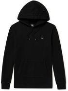 C.P. Company - Logo-Appliquéd Garment-Dyed Cotton-Jersey Hoodie - Black