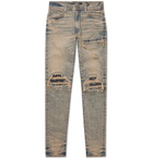 AMIRI - MX1 Skinny-Fit Panelled Distressed Stretch-Denim Jeans - Men - Blue