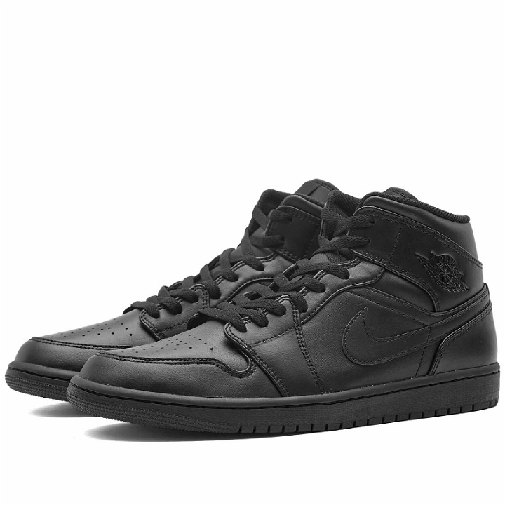 Photo: Air Jordan Men's 1 Mid Sneakers in Black