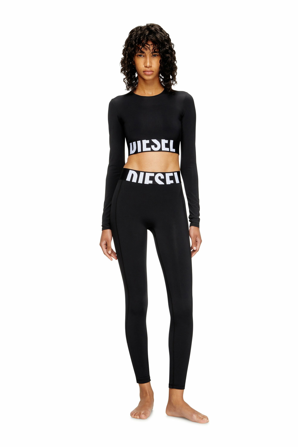 Diesel Microfibre leggings with cut-off logo - Pants Womens in Black