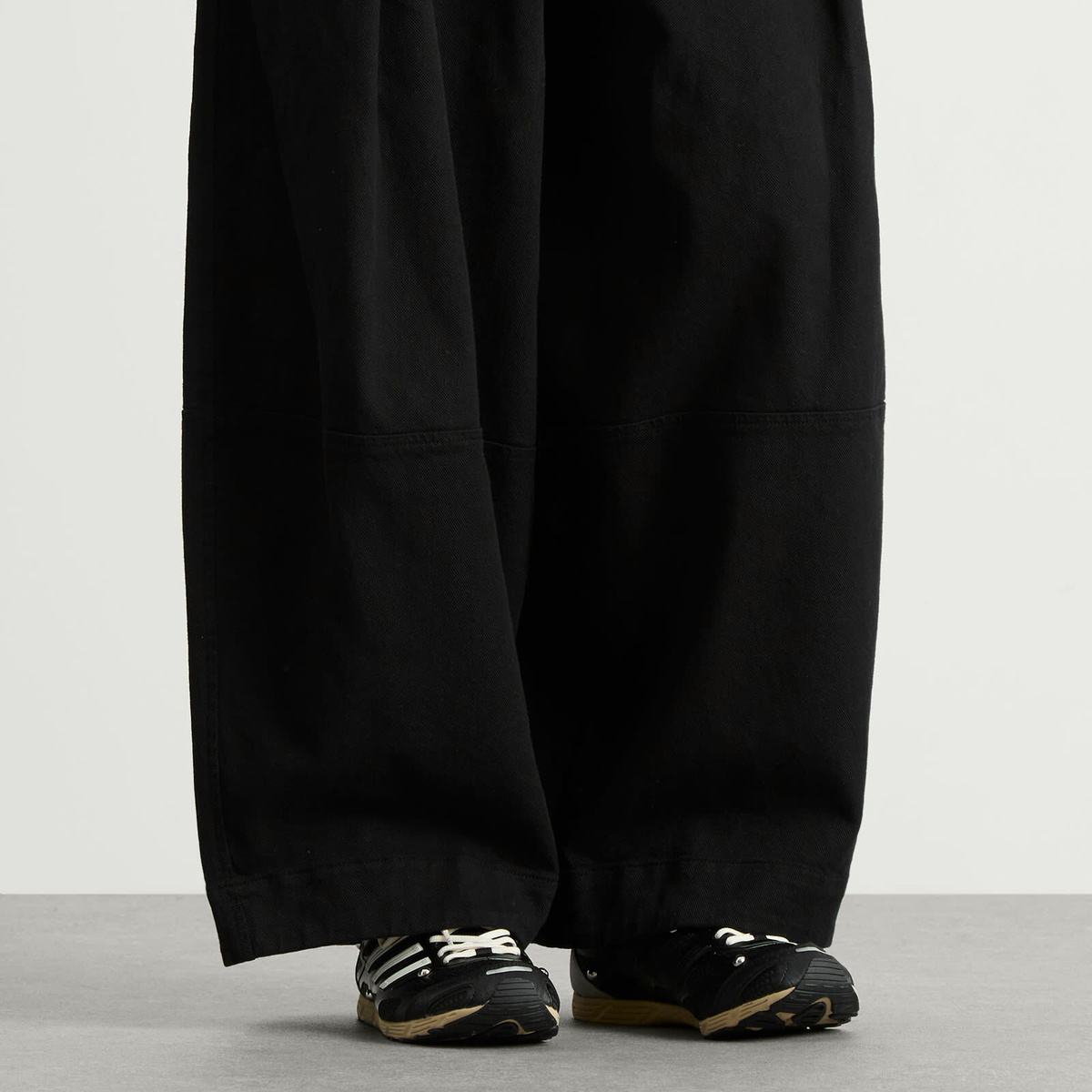 Adidas x SFTM Adizero Sneaker in Core Black/Cream White/Silver