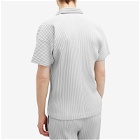 Homme Plissé Issey Miyake Men's Pleated Polo Shirt in Light Grey
