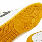 Air Jordan 1 Retro Hi-Top OG RMSTD Sneakers in Yellow Ochre/Black/Sail