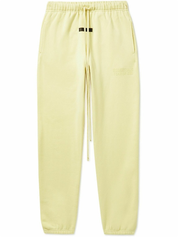 Photo: FEAR OF GOD ESSENTIALS - Tapered Logo-Flocked Cotton-Blend Jersey Sweatpants - Yellow