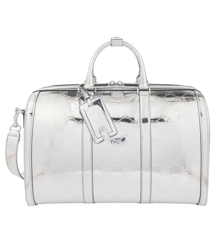 Photo: Gucci GG Medium debossed duffel bag