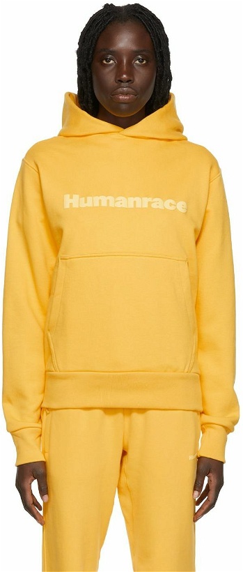 Photo: adidas x Humanrace by Pharrell Williams Yellow Humanrace Basics Hoodie