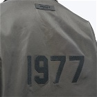 Fear of God ESSENTIALS Men's 1977 Nylon Coaches Jacket in Off Black