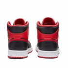 Air Jordan Men's 1 Mid Sneakers in Black/Fire Red