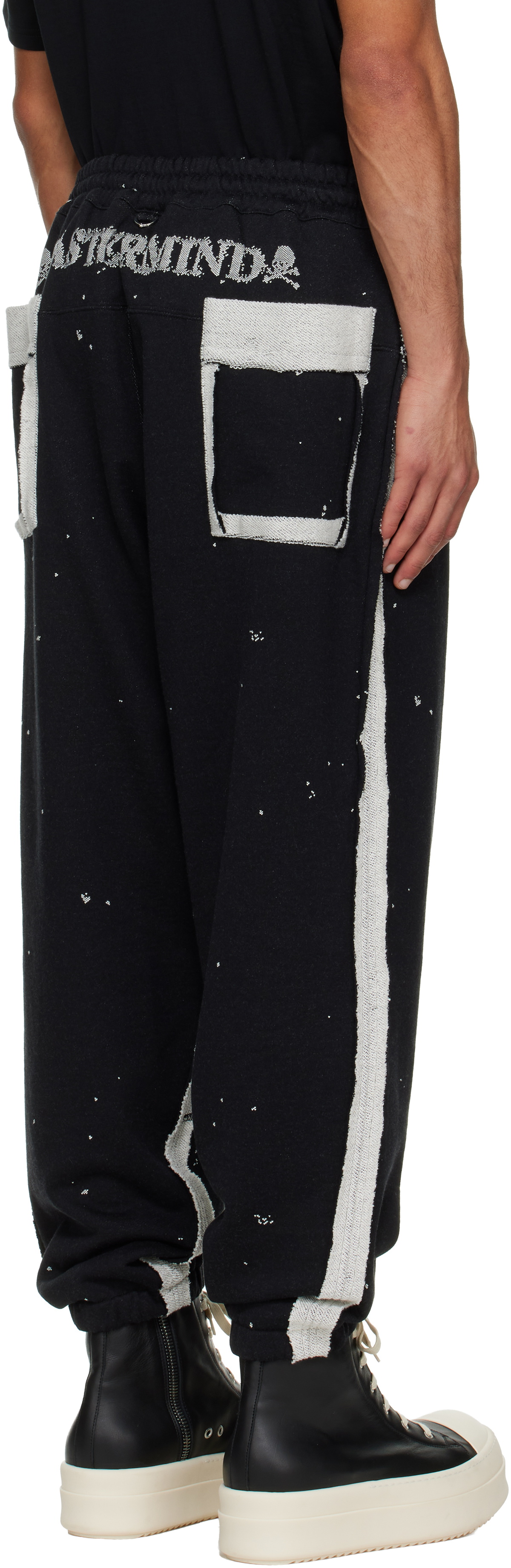 MASTERMIND WORLD Black Cut-Off Sweatpants