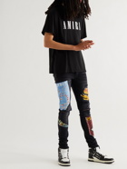 AMIRI - Skinny-Fit Distressed Printed Jeans - Black