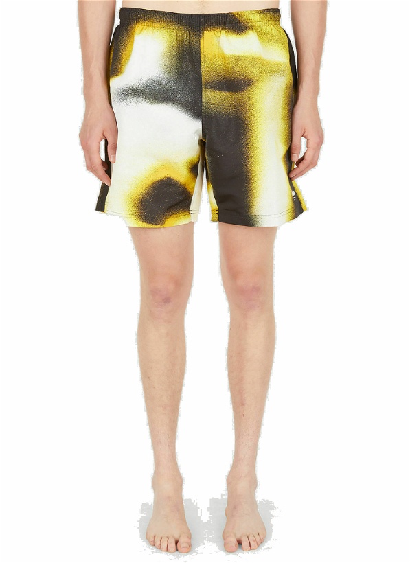 Photo: Graffiti Spray Swim Shorts in Yellow