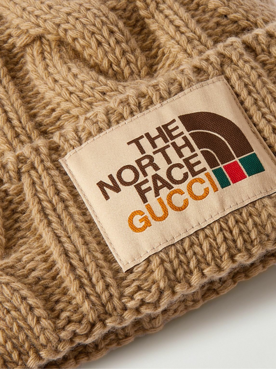 GUCCI - The North Face Logo-Appliquéd Cable-Knit Wool Beanie  display picture 1