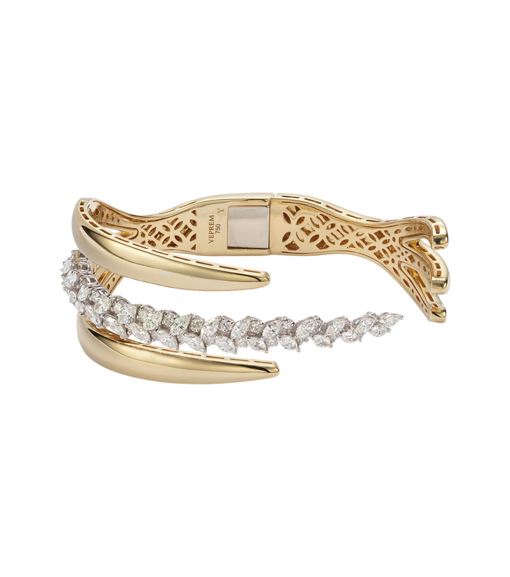 Photo: Yeprem Golden Strada 18kt white and yellow gold bangle with diamonds