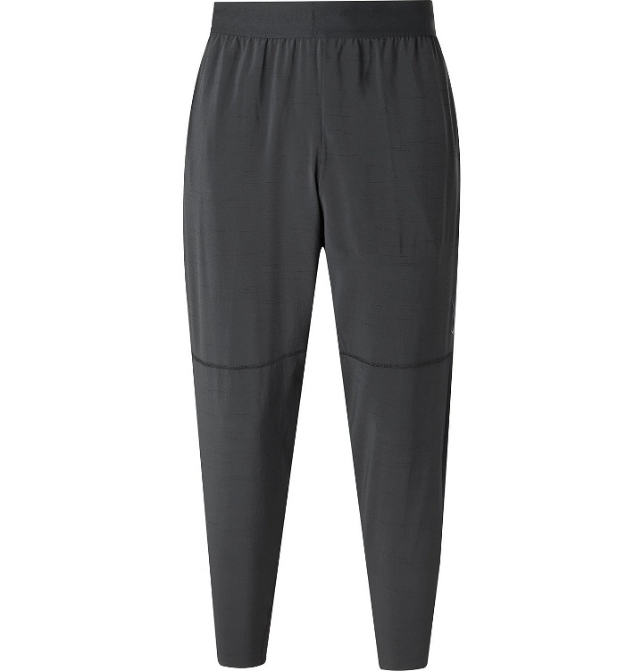 Photo: Nike Training - Tapered Mesh-Panelled Dri-FIT Yoga Sweatpants - Black